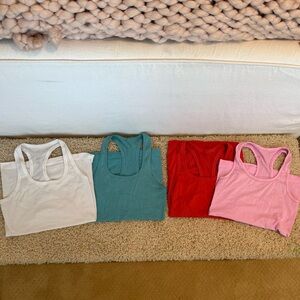 Set of four lululemon tank tops